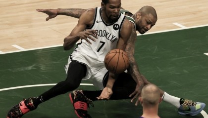  字母哥暴扣统治攻防两端，雄鹿加时险胜篮网显韧性